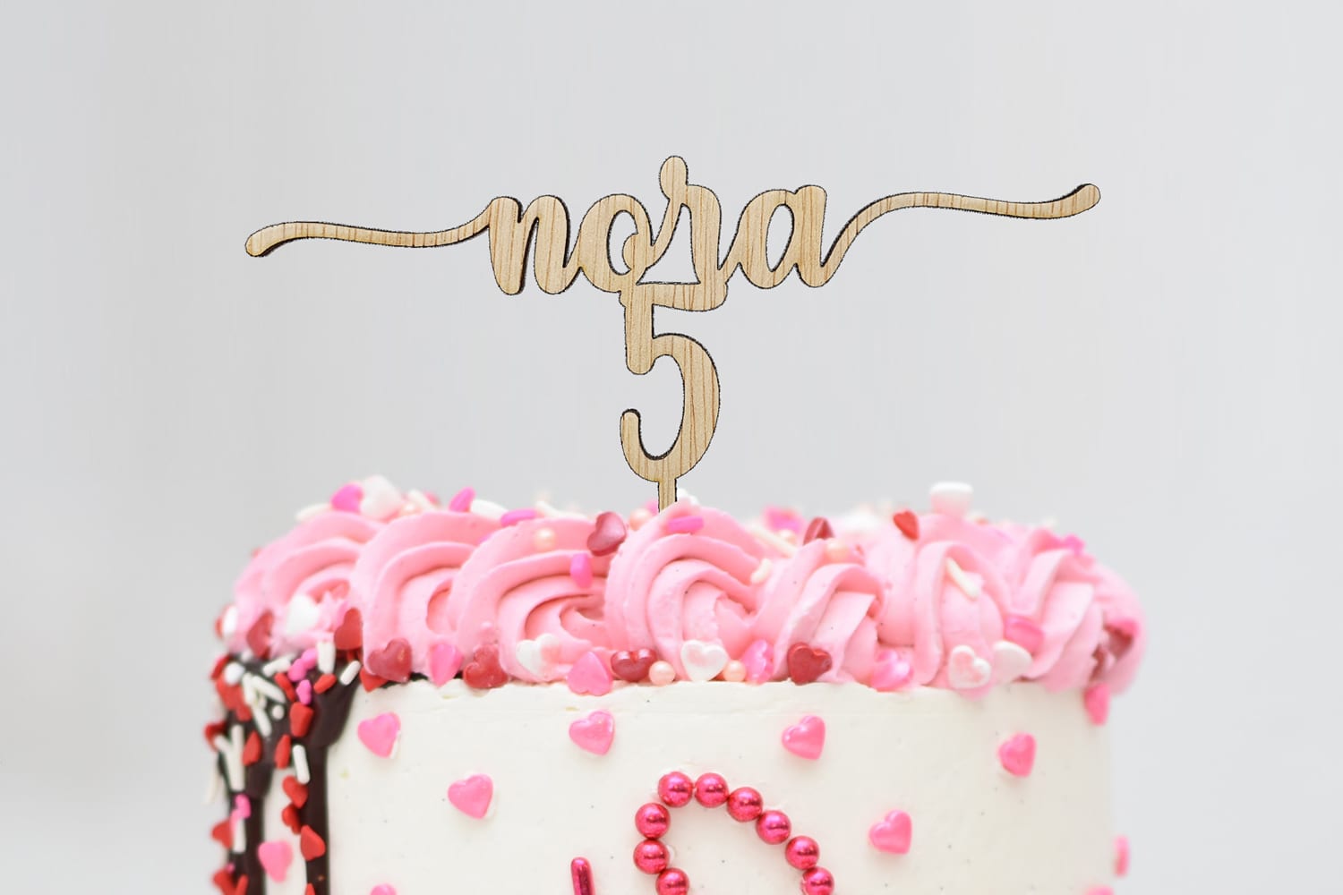 taarttopper voor nora die 5 wordt